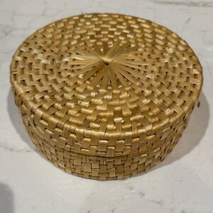 Vintage woven rattan coaster set with a matching lidded storage basket